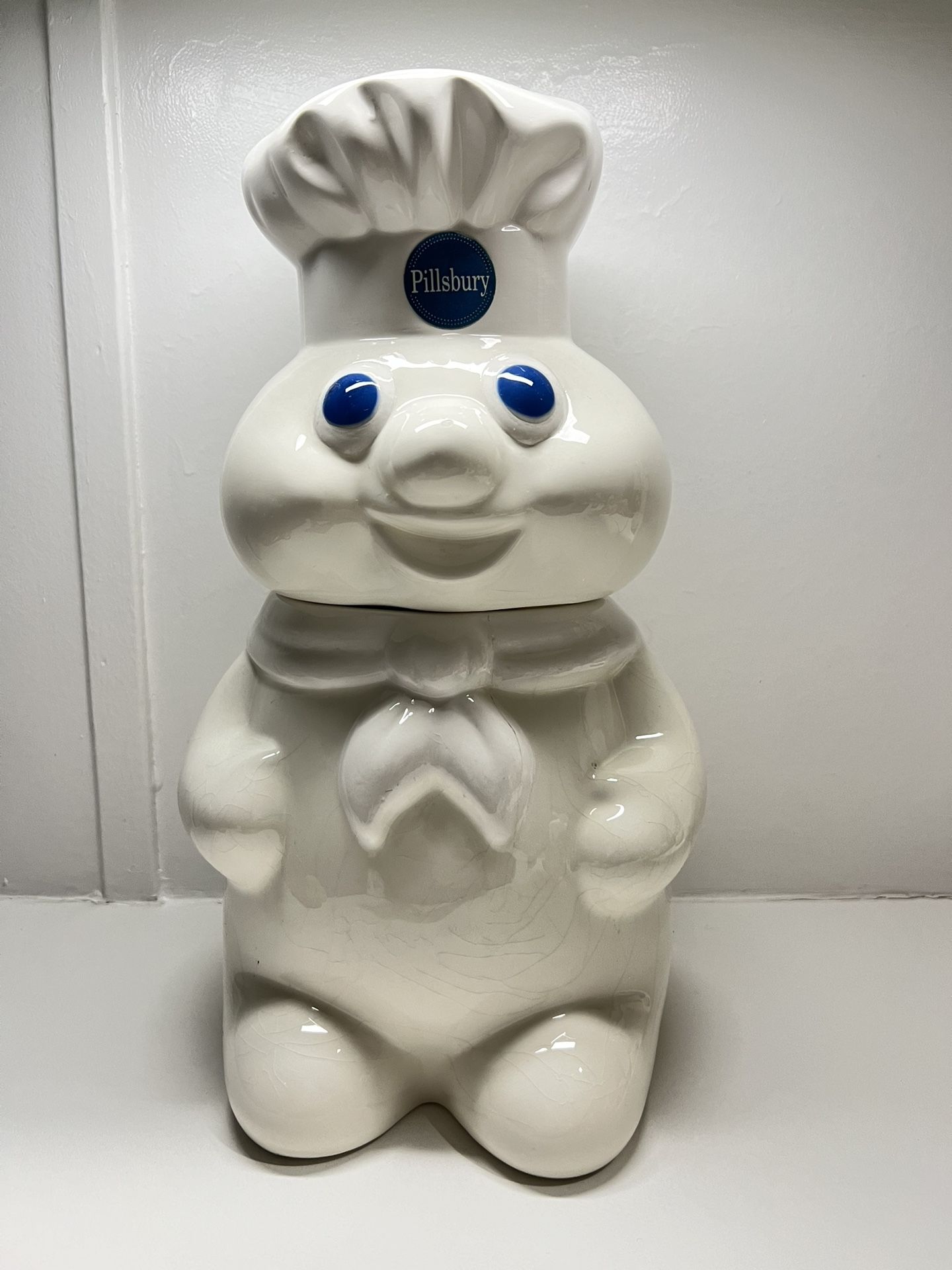 Vintage Advertising 1988 The Pillsbury Company Ceramic Doughboy Cookie Jar condition chips, considering the age condition (see photos) Measures 12