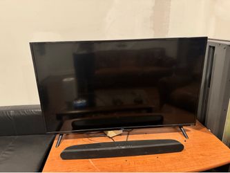 50” Roku TV with Soundbar and Remotes