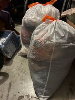 Two large bags of clothes for $10 for both