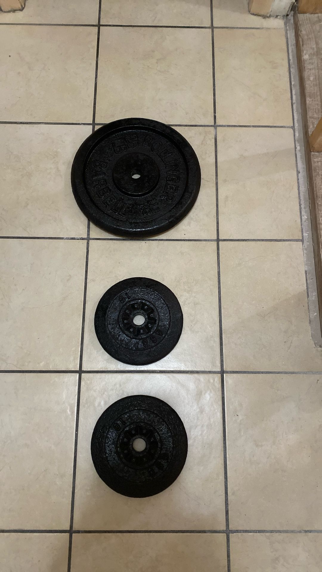Gym disc of 25 pound and two of 10 pound. $20 dollars