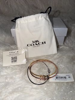 NWT Coach Stackable Bangle Bracelet Set in Gold, Rose Gold, & Silver.