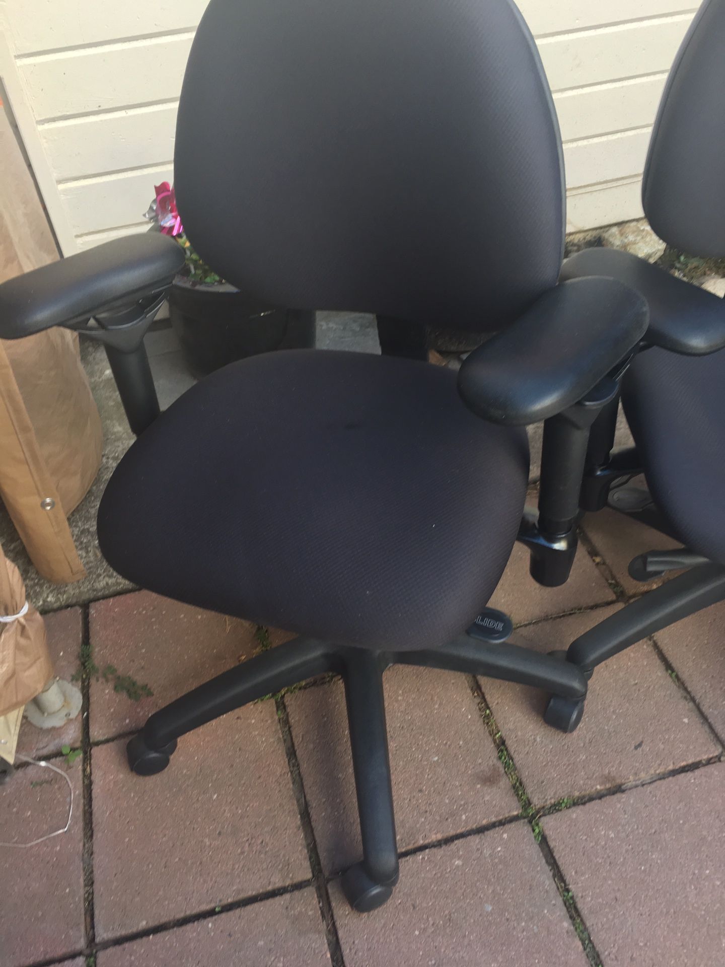 2 black office chairs BODYBILT