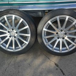 A Pair Of Rims And Tires