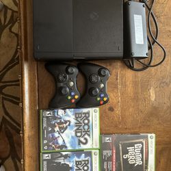 Xbox 360 E + 2 Controllers and 3 Games
