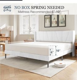 UPHOLSTERED KING SIZE PLATFORM BED

New on the box condition