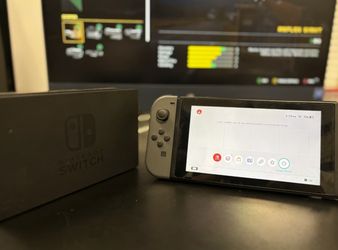 Nintendo Switch With grey joycons 