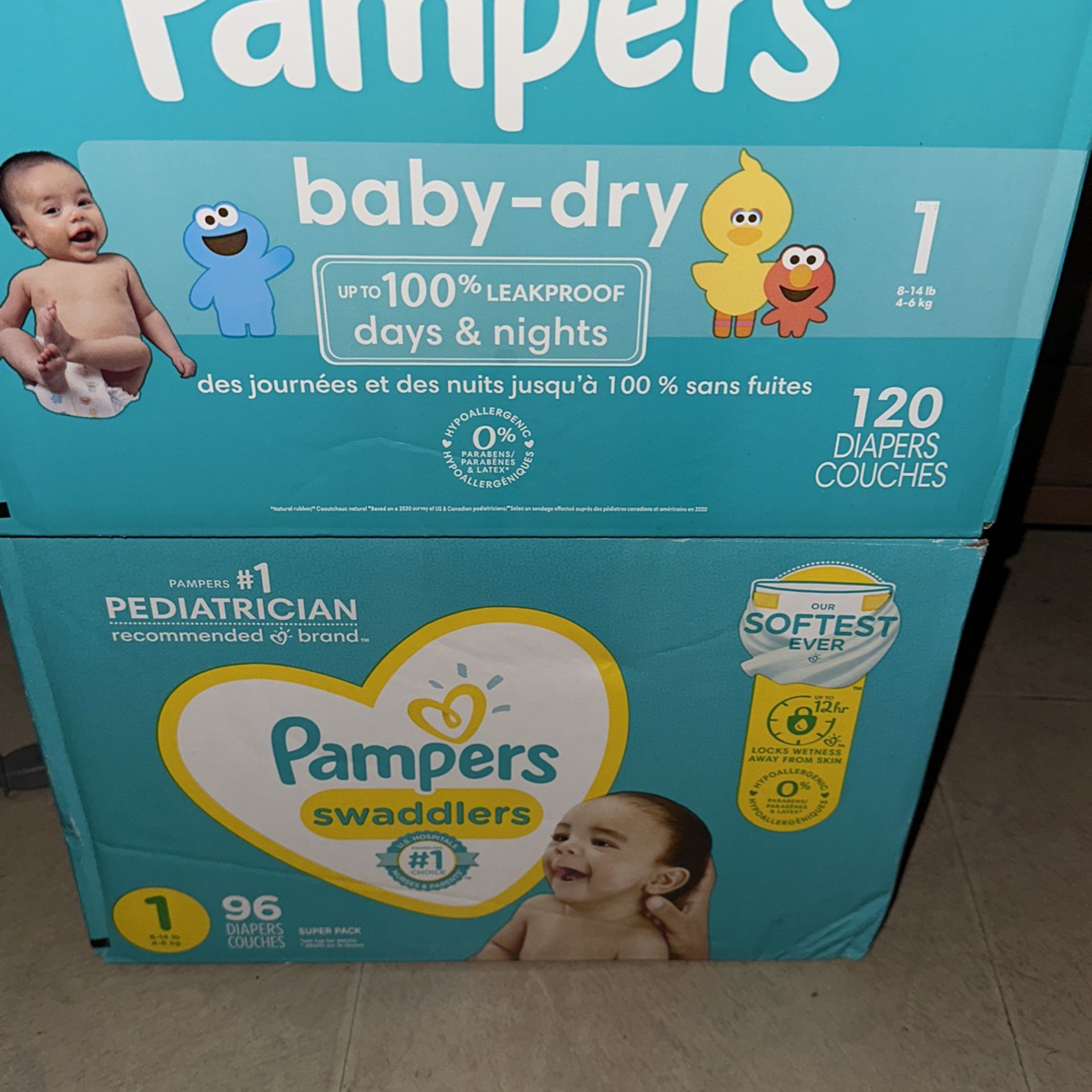2 New Boxes Of Diapers Size 1