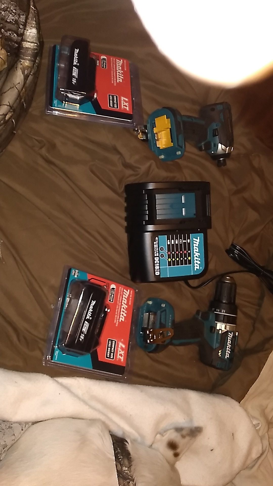 New Makita drill ,impact, 2 batteries and charger with bag.