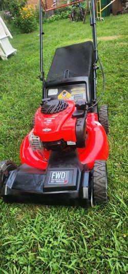 Craftsman 21" lawnmower shelf-self-propelled excellent condition.