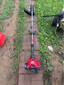 Craftsman was 2200 25cc 2-cycle, gas-powered straight-shaft string trimmer