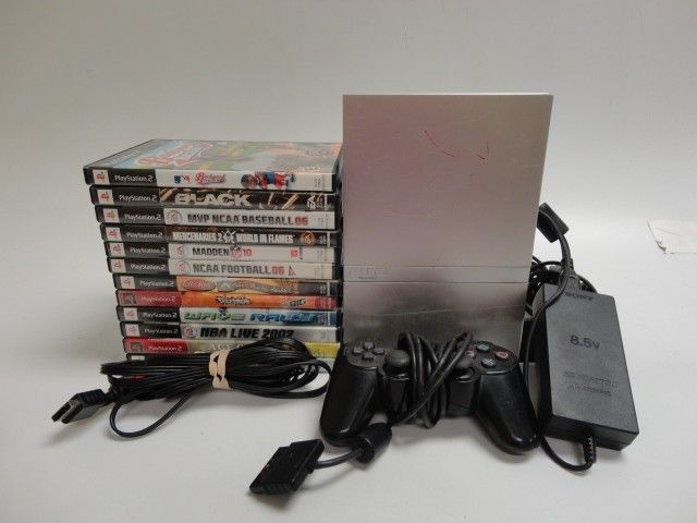 Playstation ps2 with 12 games and controller