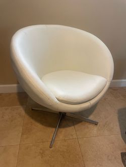 White leather circular swivel chair