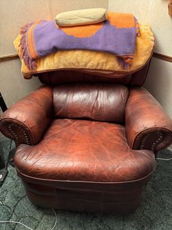 Small leather recliner no holes or tears