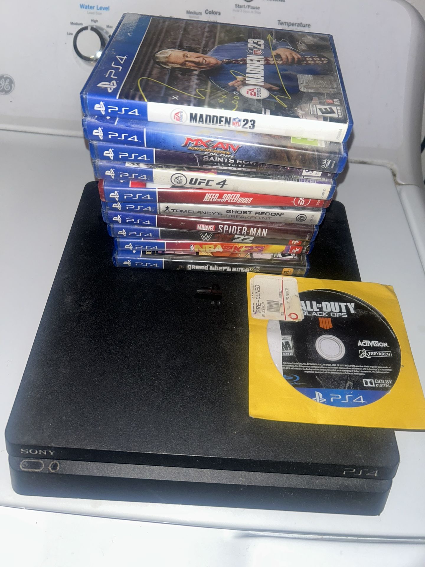 Ps4 Console and 11 games, No wires or controllers included.