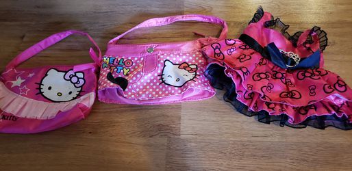 Hello Kitty two purses, ring and one doll dress $8 for all