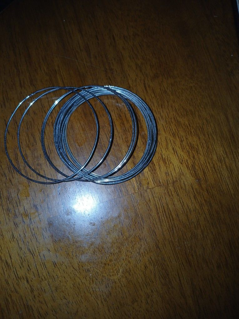 Bundle Of Silver Tone Metal Bangles
