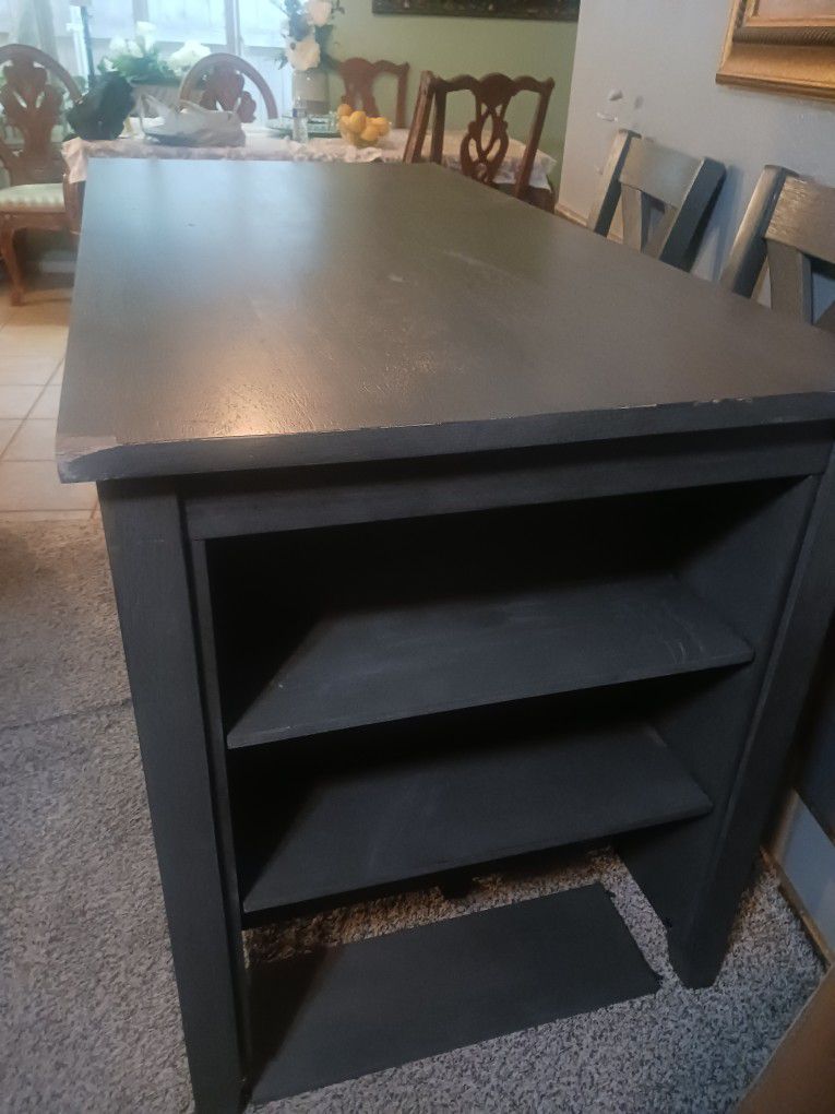 Gray Table With Two Chairs