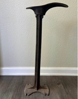 Antique cobbler shoe stand