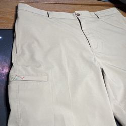 Greg Norman Men’s Shorts; Tan; Size 38 Waist.