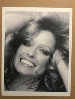 Farrah Fawcett 8 1/2” x 11” photo with black sharpie autograph real signed but it’s a reprint