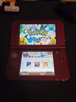 Nintendo 3ds XL with 5 pokemon games + bank/transporter