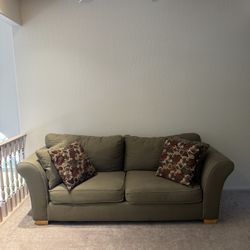 Green Couch With Pillows 