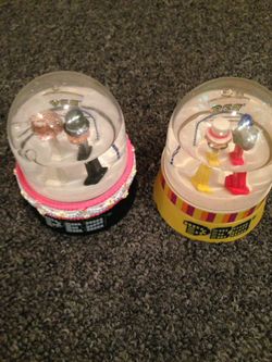 Two Pez Globes