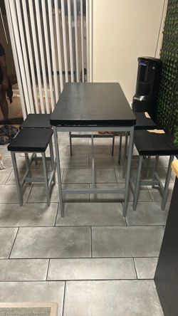 Dining Table comes with 4 chairs