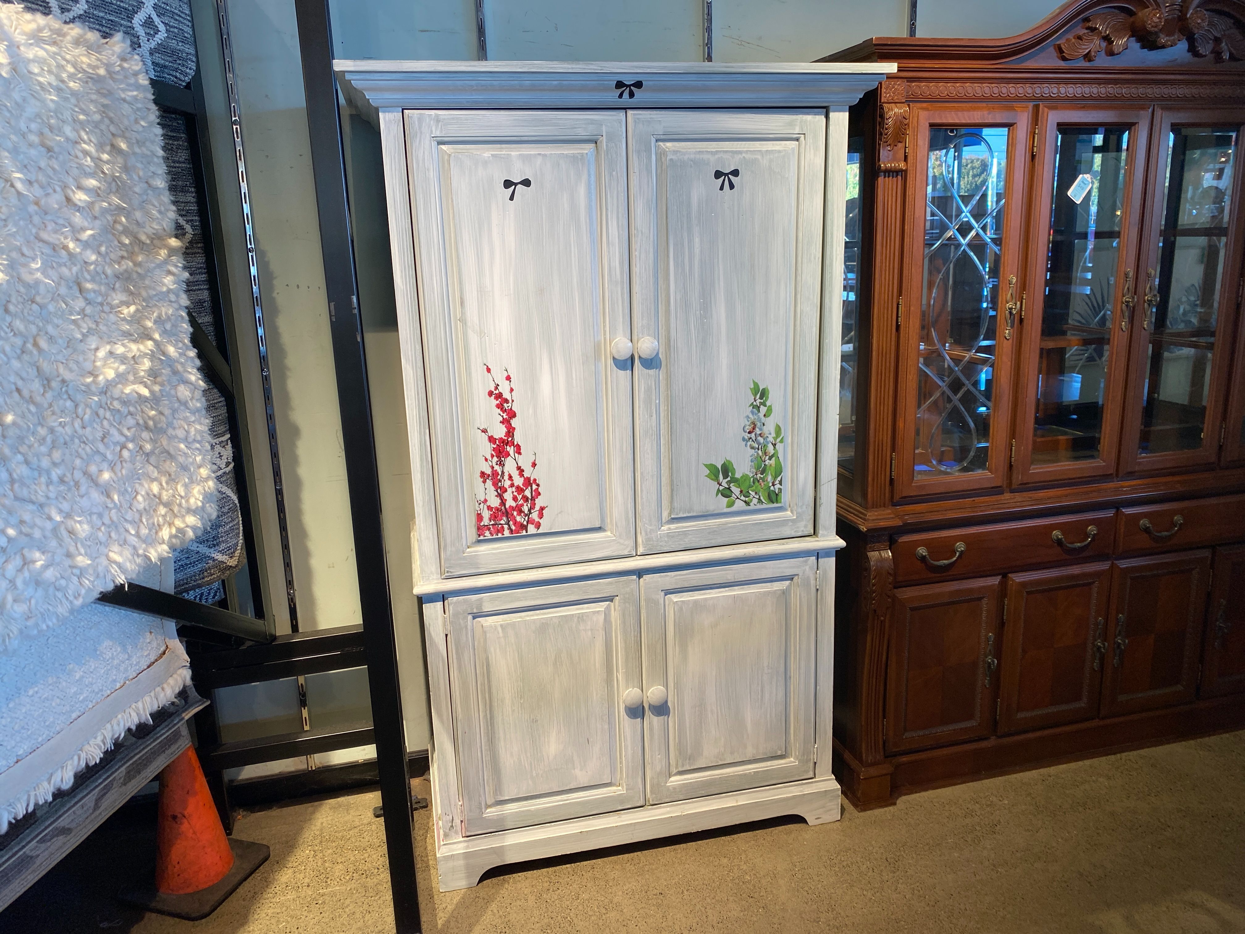 Rustic DIY Armoire with Floral Accents