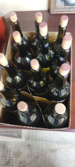 12 empty wine  bottles for free
