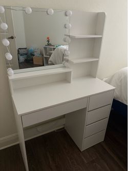 White vanity with lights