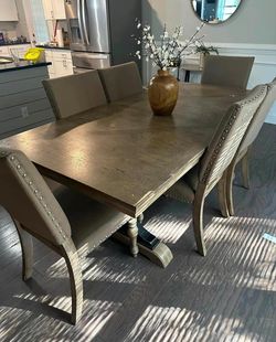 Elegant Dining Table & 6 Upholstered Chairs
