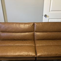 Cognac Faux Leather Futon. 