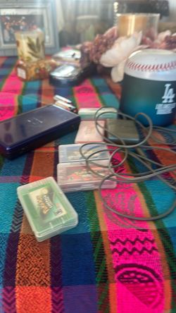 Nintendo DS with Pokémon Game Cartridges and Charger