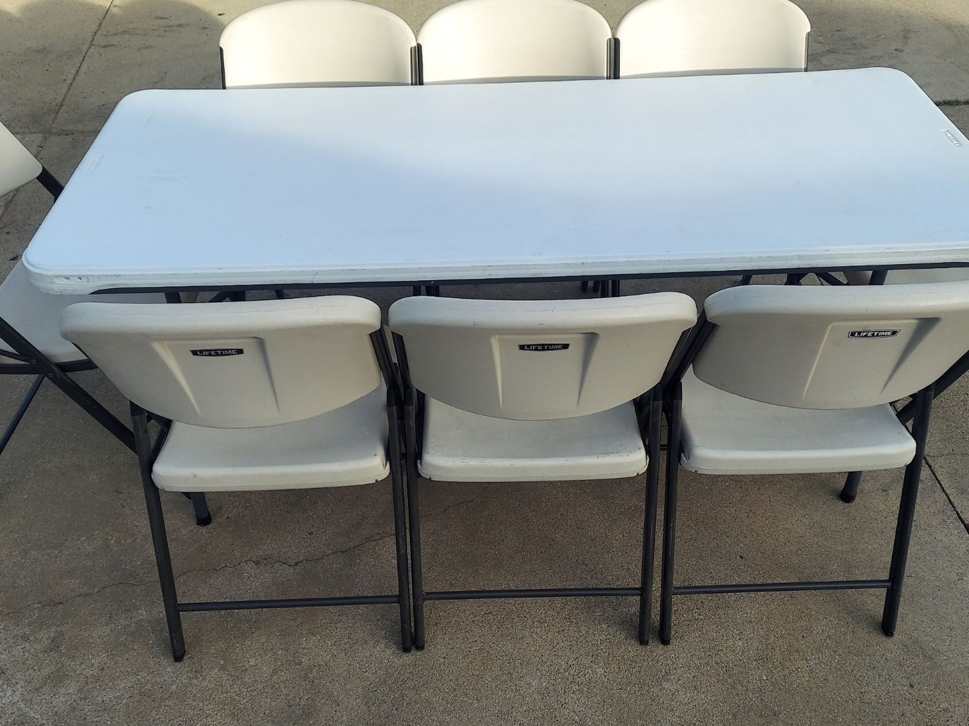 8 Lifetime Adult Folding Chairs And 1 Lifetime 6ft Table