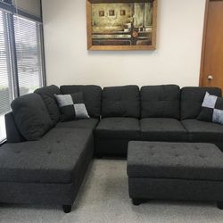 Charcoal linen sectional couch and ottoman