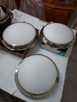 3 Overhead Dome Lights . 16.5 inches wide by 5 inches height . Located in Palm Beach Gardens