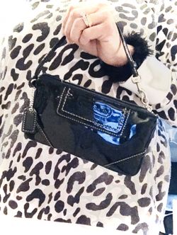 Dark navy Coach wristlet
