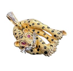18kt diamond & ruby jaguar / cheetah pendant