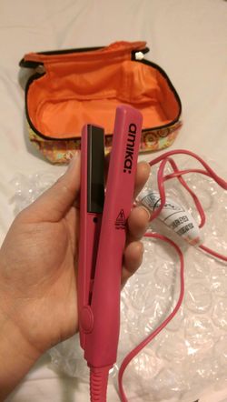 Working tiny hair straightener. Not a toy.