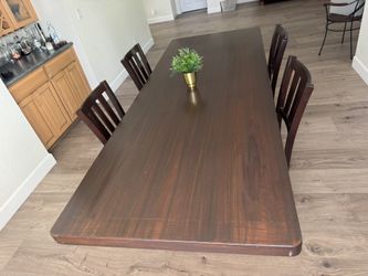 LOWER PRICE NOW Dining Table -solid wood with 8 Chairs (4 showing)