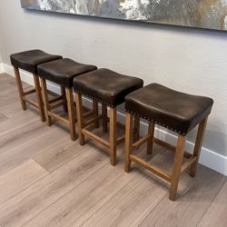 FOUR 24” Counter Height Saddle Bar Stools w/ Curved Seats And Nailhead Pin Design 