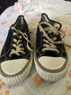 Mutuoni. Black. Tennis. 