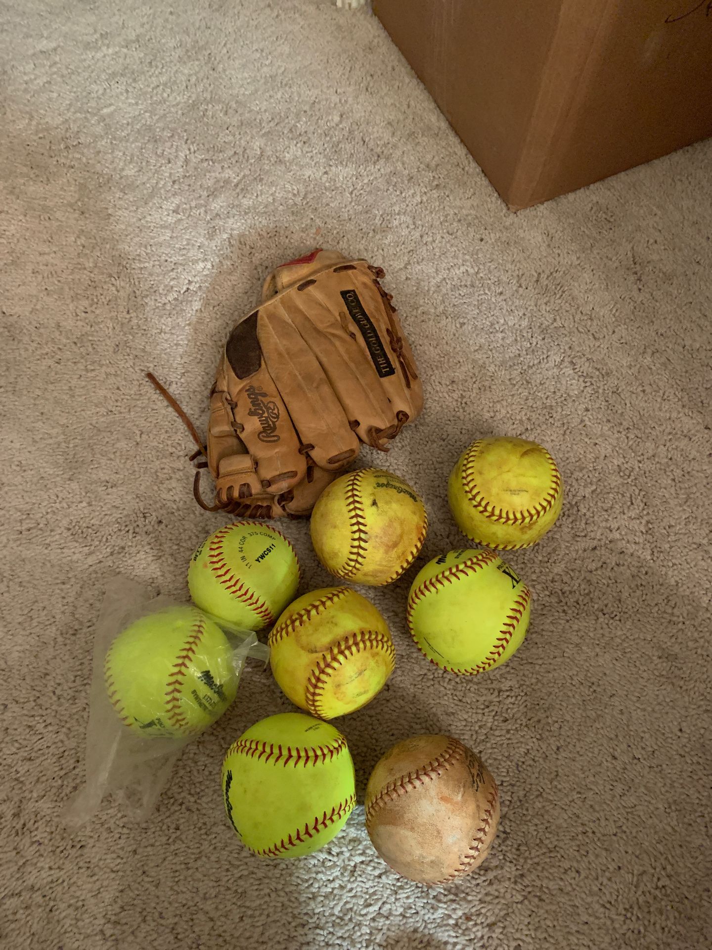 Right handed Glove and collection of 8 softballs