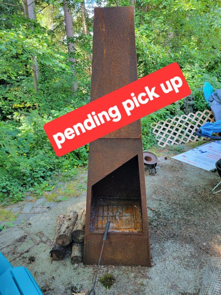 Metal Fire Pit Chimney Naturally Rusted.