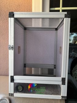 Vivid Chameleons and habitats small enclosure with water tray