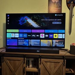 55 Inch LG OLED TV w/ LG 3 Channel Surround