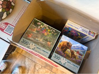 3 large boxes of puzzles