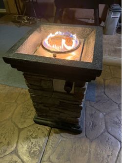 Fire pit with propane tank