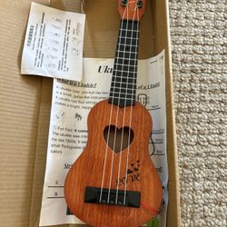 Ukulele toy new